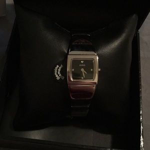 Small silver vintage Guess watch